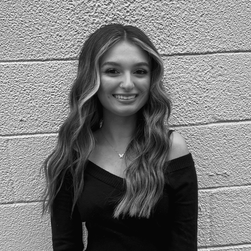 Portrait of Dani, a professional stylist at Studio 455 Salon, showcasing their expertise and style.