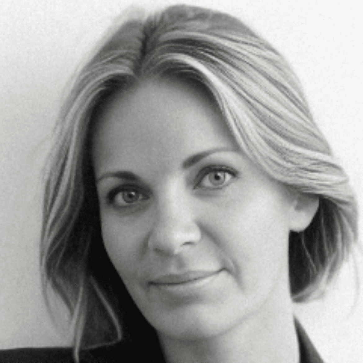 Portrait of Jeannie, a professional stylist at Studio 455 Salon, showcasing their expertise and style.