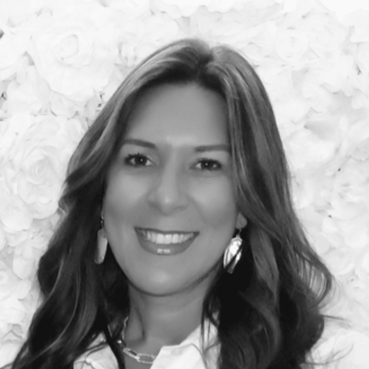 Portrait of Lauren, a professional stylist at Studio 455 Salon, showcasing their expertise and style.