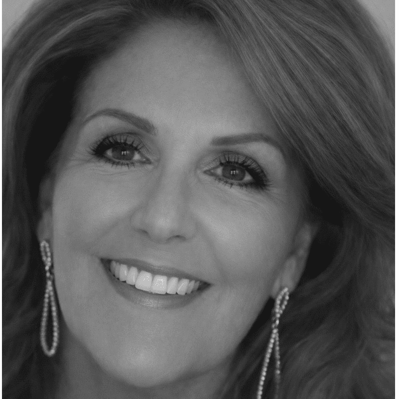 Portrait of Sharon, a professional stylist at Studio 455 Salon, showcasing their expertise and style.