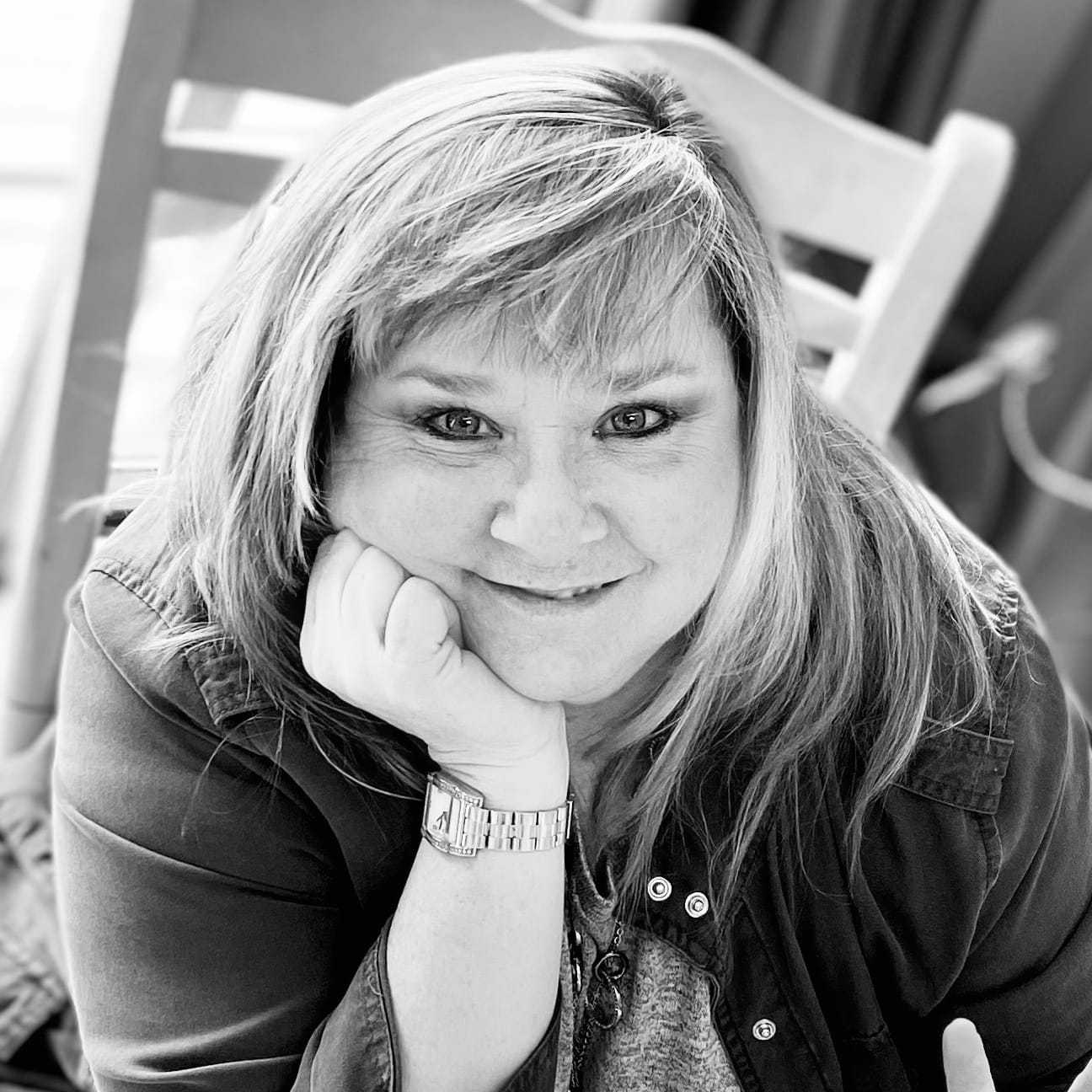 Portrait of Amy, a professional stylist at Studio 455 Salon, showcasing their expertise and style.