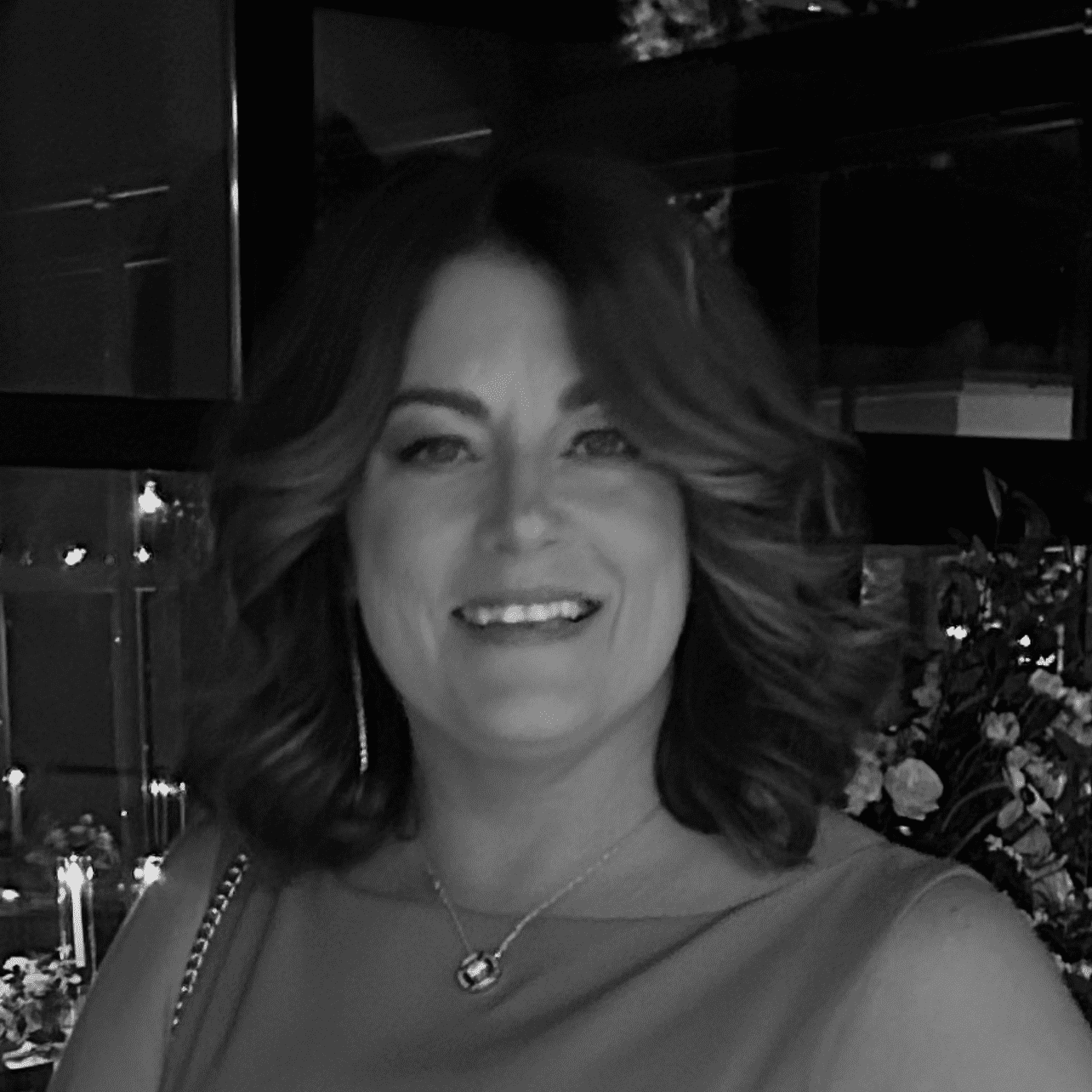 Portrait of Rita, a professional stylist at Studio 455 Salon, showcasing their expertise and style.